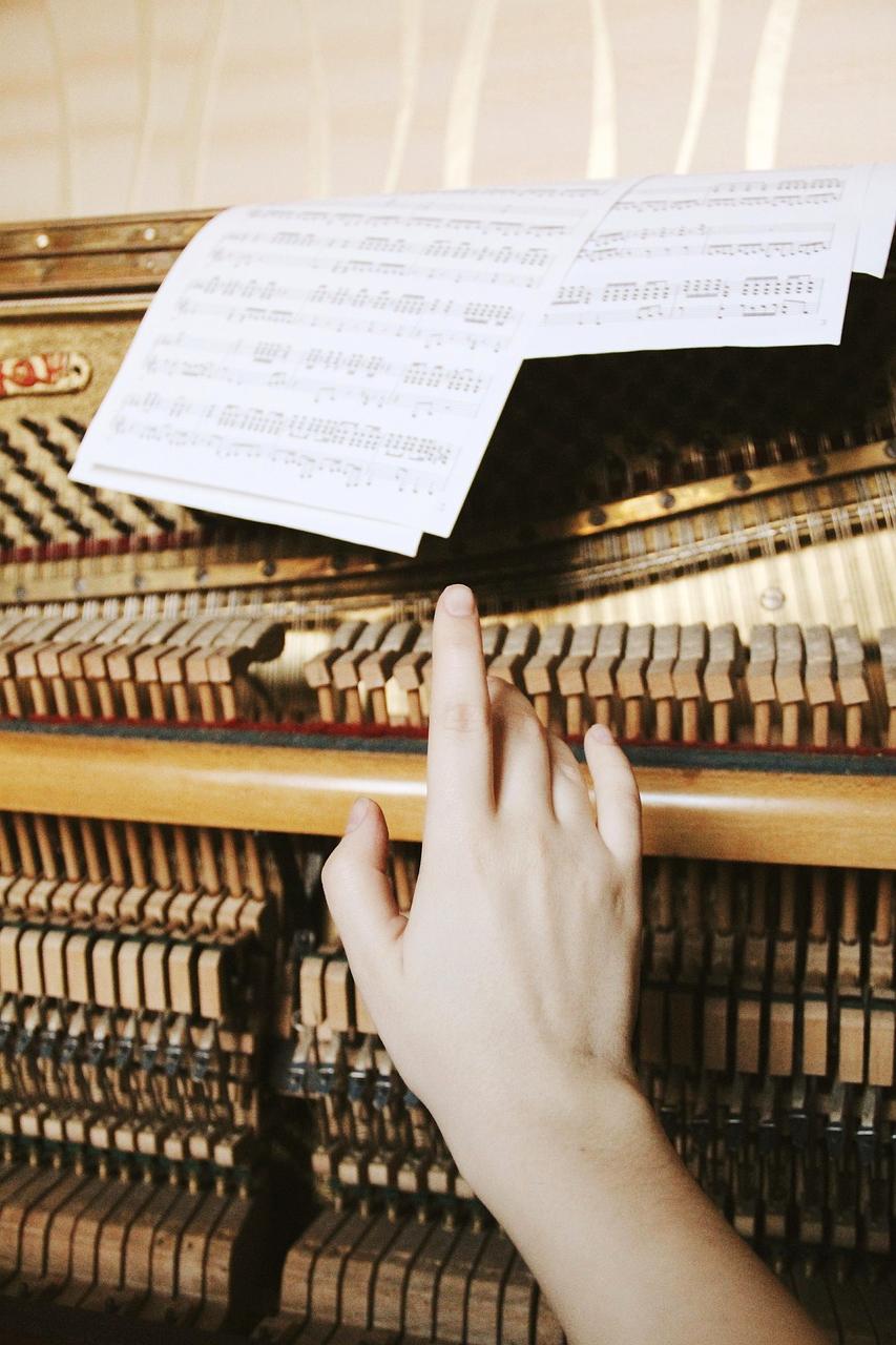 Futuristic concert hall with holographic displays and advanced lighting systems